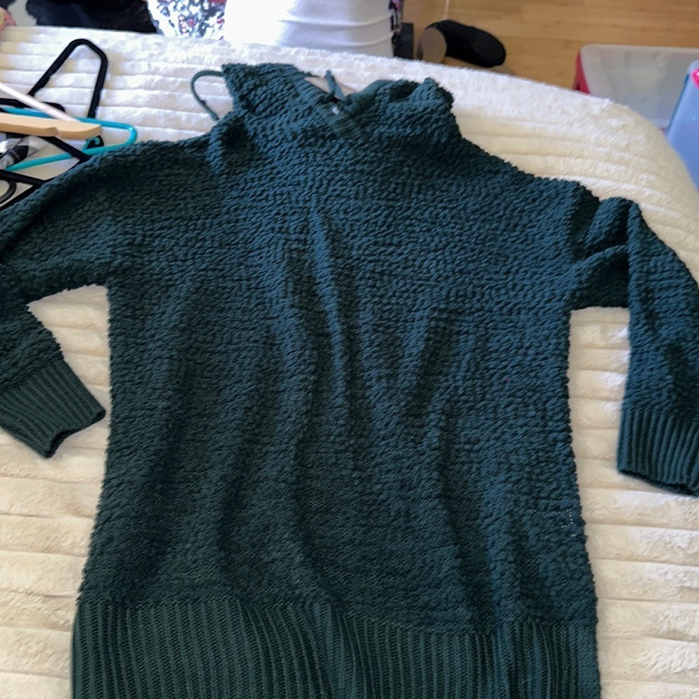 Size small long sleeve, popcorn, sweater with side, slits, and drawstring hood